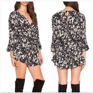 - FREE PEOPLE All Right Ruffles Romper size XS